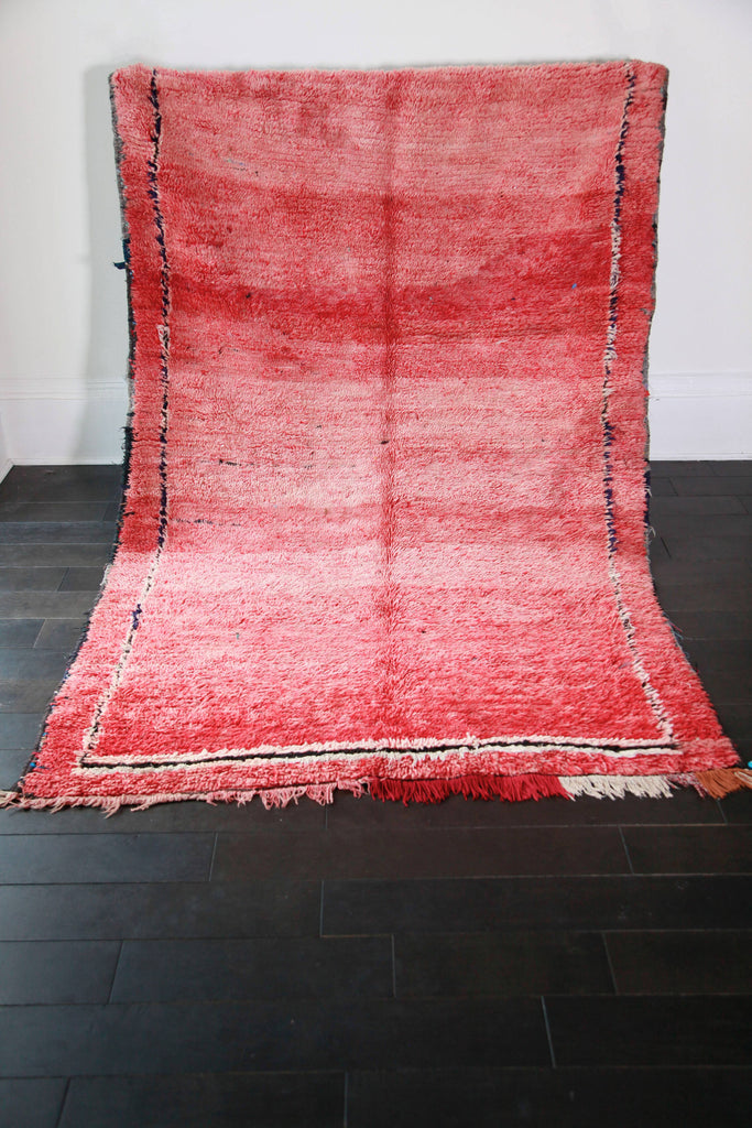 Semi-antique, versatile, reversible, mid-sized handmade Berber knotted Chichaoua rug, monochrome pile.