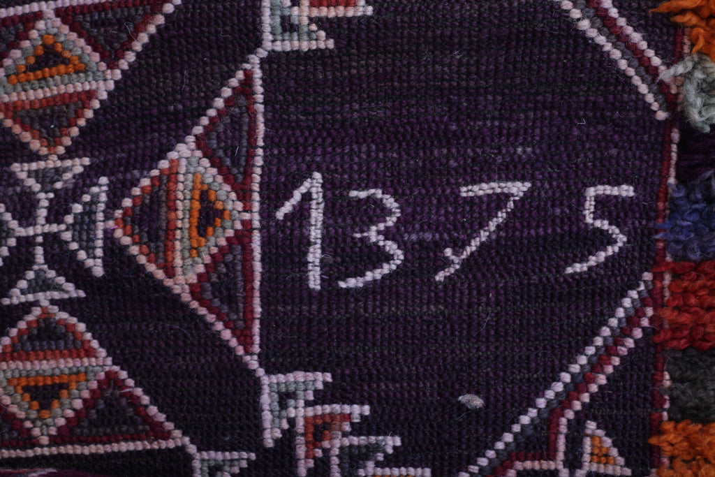 Close-up of the reverse of the beautiful Beni M'guild rug showing the inlaid Islamic date (1375).